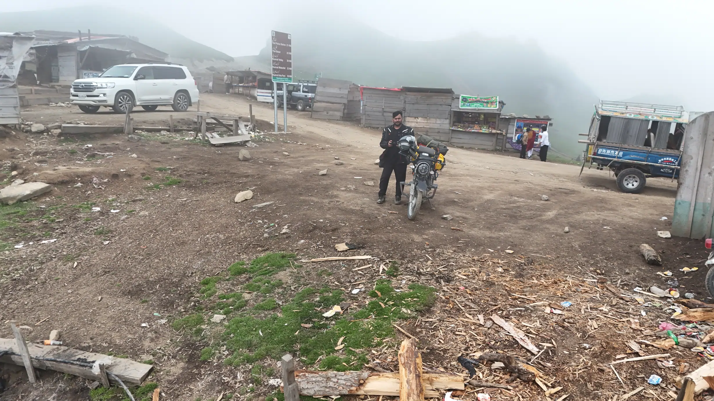 Farhan Saqib with his motorcycle at Badgoi Pass